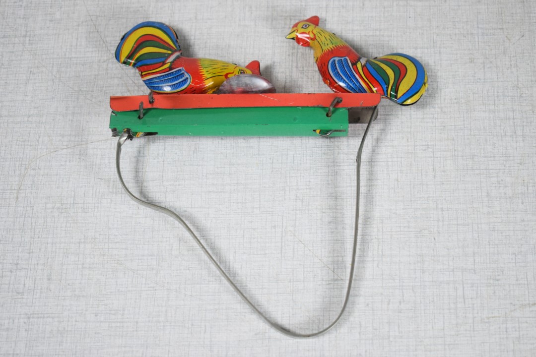 Tin Toy: Two chickens on stick